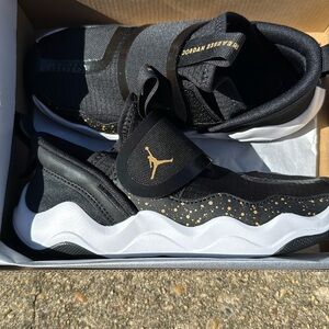 Jordan Black and Gold Athletic Shoes size 1.5Y